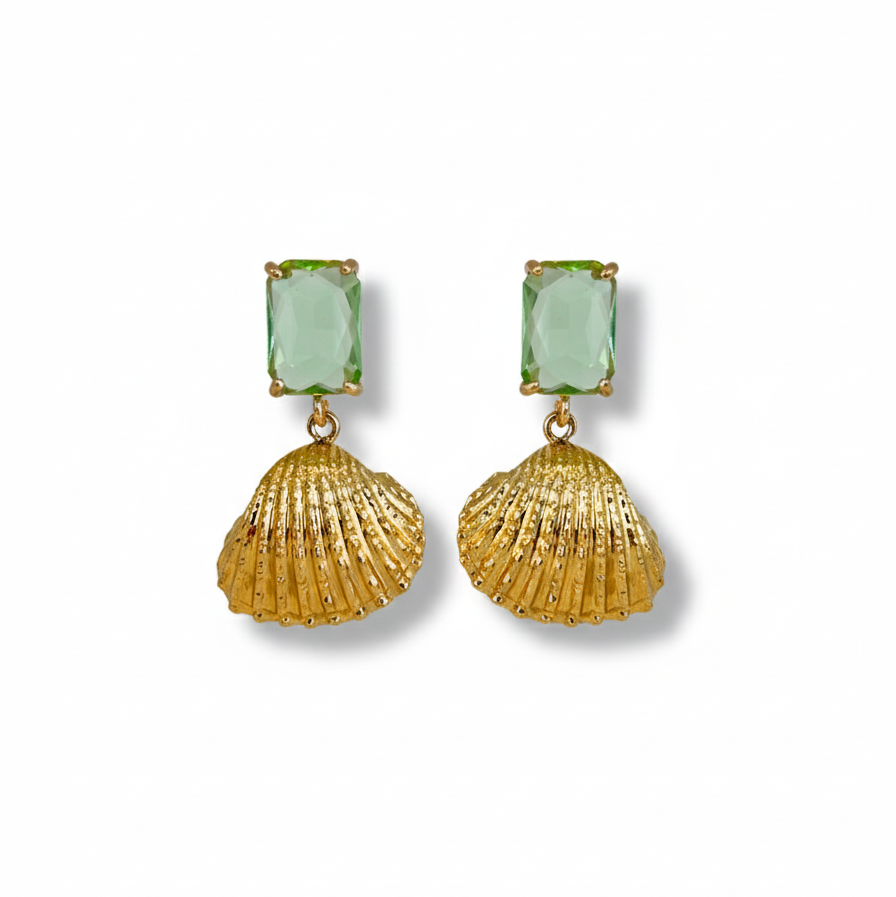 Gold shell-shaped earrings with green gemstones on a white background